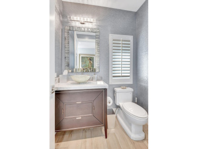 FULLY RENOVATED two-story, 3 bedroom + office home in St on St. Andrews Country Club of Boca Raton in Florida - for sale on GolfHomes.com, golf home, golf lot