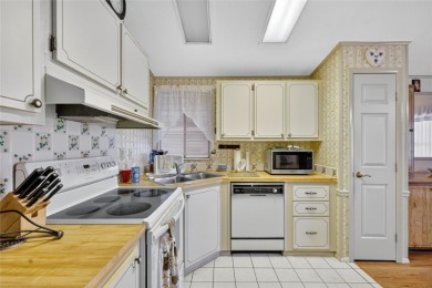 Come take a look at this well maintained home in The Villages at on Silver Lake Executive Golf Course in Florida - for sale on GolfHomes.com, golf home, golf lot