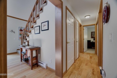 Meticulously maintained log-sided lakefront on TinkWig Lake with on Woodloch Springs Country Club in Pennsylvania - for sale on GolfHomes.com, golf home, golf lot