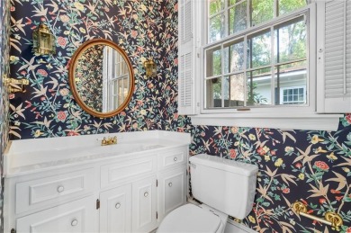 Situated on two lots with nearly an acre of land in one of the on Country Club of Mobile in Alabama - for sale on GolfHomes.com, golf home, golf lot
