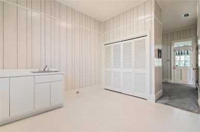Situated on two lots with nearly an acre of land in one of the on Country Club of Mobile in Alabama - for sale on GolfHomes.com, golf home, golf lot