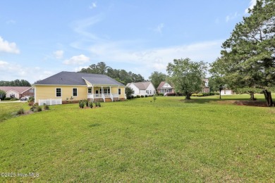 Welcome to your coastal sanctuary, where the tranquil shores of on Lockwood Folly Country Club in North Carolina - for sale on GolfHomes.com, golf home, golf lot