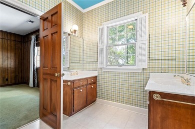 Situated on two lots with nearly an acre of land in one of the on Country Club of Mobile in Alabama - for sale on GolfHomes.com, golf home, golf lot