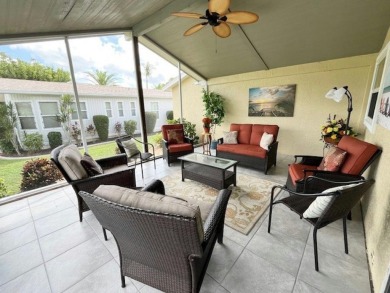 This beautiful stucco Casa Grande 2bd/2ba + Family room home is on Del Tura Golf and Country Club in Florida - for sale on GolfHomes.com, golf home, golf lot