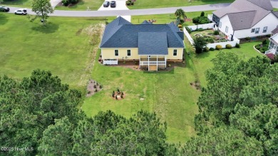 Welcome to your coastal sanctuary, where the tranquil shores of on Lockwood Folly Country Club in North Carolina - for sale on GolfHomes.com, golf home, golf lot