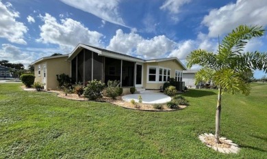 This beautiful stucco Casa Grande 2bd/2ba + Family room home is on Del Tura Golf and Country Club in Florida - for sale on GolfHomes.com, golf home, golf lot