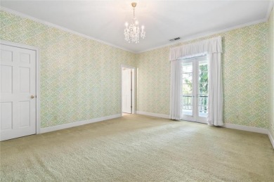 Situated on two lots with nearly an acre of land in one of the on Country Club of Mobile in Alabama - for sale on GolfHomes.com, golf home, golf lot