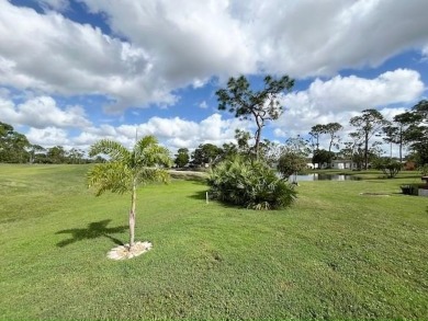 This beautiful stucco Casa Grande 2bd/2ba + Family room home is on Del Tura Golf and Country Club in Florida - for sale on GolfHomes.com, golf home, golf lot