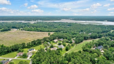 Welcome to your coastal sanctuary, where the tranquil shores of on Lockwood Folly Country Club in North Carolina - for sale on GolfHomes.com, golf home, golf lot