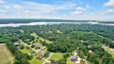 Welcome to your coastal sanctuary, where the tranquil shores of on Lockwood Folly Country Club in North Carolina - for sale on GolfHomes.com, golf home, golf lot