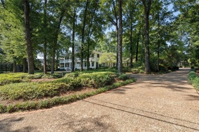 Situated on two lots with nearly an acre of land in one of the on Country Club of Mobile in Alabama - for sale on GolfHomes.com, golf home, golf lot