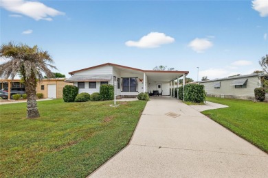 Come take a look at this well maintained home in The Villages at on Silver Lake Executive Golf Course in Florida - for sale on GolfHomes.com, golf home, golf lot