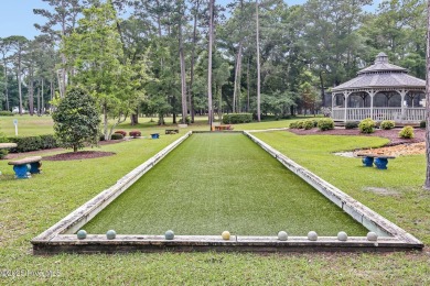 Welcome to your coastal sanctuary, where the tranquil shores of on Lockwood Folly Country Club in North Carolina - for sale on GolfHomes.com, golf home, golf lot