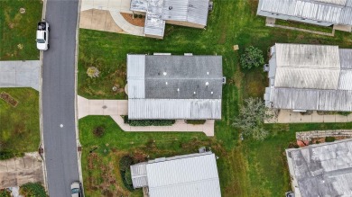 Come take a look at this well maintained home in The Villages at on Silver Lake Executive Golf Course in Florida - for sale on GolfHomes.com, golf home, golf lot