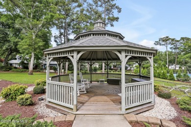 Welcome to your coastal sanctuary, where the tranquil shores of on Lockwood Folly Country Club in North Carolina - for sale on GolfHomes.com, golf home, golf lot