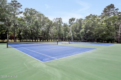 Welcome to your coastal sanctuary, where the tranquil shores of on Lockwood Folly Country Club in North Carolina - for sale on GolfHomes.com, golf home, golf lot