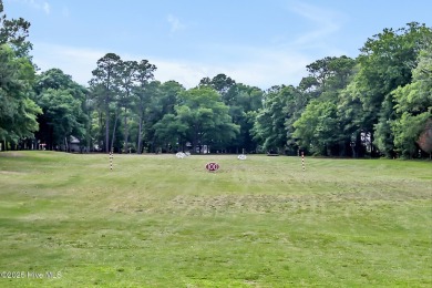 Welcome to your coastal sanctuary, where the tranquil shores of on Lockwood Folly Country Club in North Carolina - for sale on GolfHomes.com, golf home, golf lot