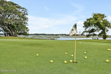 Welcome to your coastal sanctuary, where the tranquil shores of on Lockwood Folly Country Club in North Carolina - for sale on GolfHomes.com, golf home, golf lot