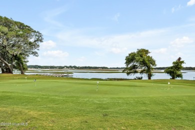 Welcome to your coastal sanctuary, where the tranquil shores of on Lockwood Folly Country Club in North Carolina - for sale on GolfHomes.com, golf home, golf lot