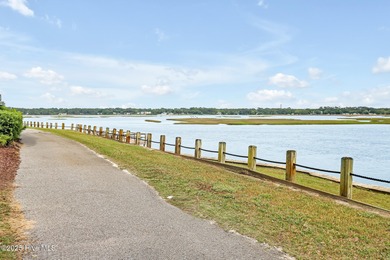 Welcome to your coastal sanctuary, where the tranquil shores of on Lockwood Folly Country Club in North Carolina - for sale on GolfHomes.com, golf home, golf lot
