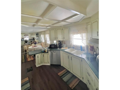 If you're seeking a spacious 2-bedroom, 2-bathroom home with a on Fairway Village Golf Course in Florida - for sale on GolfHomes.com, golf home, golf lot