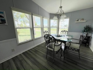 Beautifully updated 2bd/2ba coastal-inspired home. Featuring on Del Tura Golf and Country Club in Florida - for sale on GolfHomes.com, golf home, golf lot