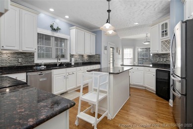 This beautiful home is located in the gated Gates Four community on Gates Four Golf and Country Club in North Carolina - for sale on GolfHomes.com, golf home, golf lot