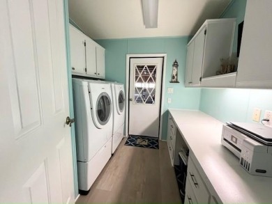 Beautifully updated 2bd/2ba coastal-inspired home. Featuring on Del Tura Golf and Country Club in Florida - for sale on GolfHomes.com, golf home, golf lot