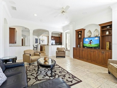 Wake up to golf course views and end your day poolside in this on ChampionsGate Golf Resort in Florida - for sale on GolfHomes.com, golf home, golf lot