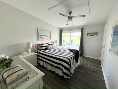 Beautifully updated 2bd/2ba coastal-inspired home. Featuring on Del Tura Golf and Country Club in Florida - for sale on GolfHomes.com, golf home, golf lot