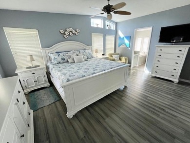 Beautifully updated 2bd/2ba coastal-inspired home. Featuring on Del Tura Golf and Country Club in Florida - for sale on GolfHomes.com, golf home, golf lot