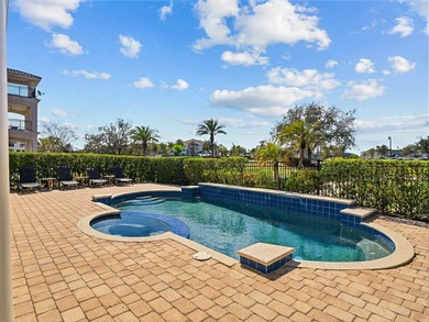 Wake up to golf course views and end your day poolside in this on ChampionsGate Golf Resort in Florida - for sale on GolfHomes.com, golf home, golf lot