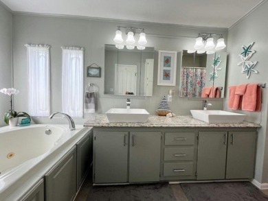 Beautifully updated 2bd/2ba coastal-inspired home. Featuring on Del Tura Golf and Country Club in Florida - for sale on GolfHomes.com, golf home, golf lot