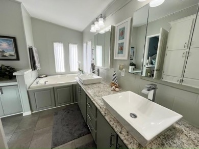 Beautifully updated 2bd/2ba coastal-inspired home. Featuring on Del Tura Golf and Country Club in Florida - for sale on GolfHomes.com, golf home, golf lot