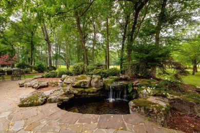 Experience luxury living in this stunning 2-story home nestled on Chenal Country Club - Bear Den Mountain in Arkansas - for sale on GolfHomes.com, golf home, golf lot