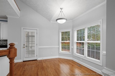 This beautiful home is located in the gated Gates Four community on Gates Four Golf and Country Club in North Carolina - for sale on GolfHomes.com, golf home, golf lot