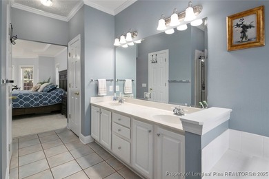 This beautiful home is located in the gated Gates Four community on Gates Four Golf and Country Club in North Carolina - for sale on GolfHomes.com, golf home, golf lot