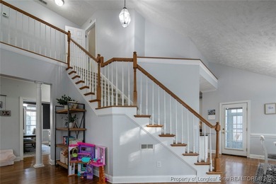 This beautiful home is located in the gated Gates Four community on Gates Four Golf and Country Club in North Carolina - for sale on GolfHomes.com, golf home, golf lot