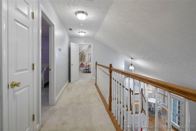 This beautiful home is located in the gated Gates Four community on Gates Four Golf and Country Club in North Carolina - for sale on GolfHomes.com, golf home, golf lot