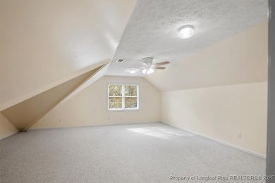 This beautiful home is located in the gated Gates Four community on Gates Four Golf and Country Club in North Carolina - for sale on GolfHomes.com, golf home, golf lot