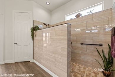 This rare, custom-designed 2,620 sq. Ft. Home on the Oasis on The Oasis Golf Club in Nevada - for sale on GolfHomes.com, golf home, golf lot