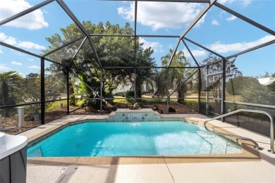 AN ABSOLUTE GEM IN SUMMERGLEN - PRIVATE SOLAR HEATED POOL HOME on Summerglen Country Club in Florida - for sale on GolfHomes.com, golf home, golf lot