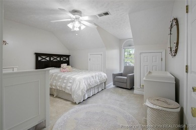 This beautiful home is located in the gated Gates Four community on Gates Four Golf and Country Club in North Carolina - for sale on GolfHomes.com, golf home, golf lot