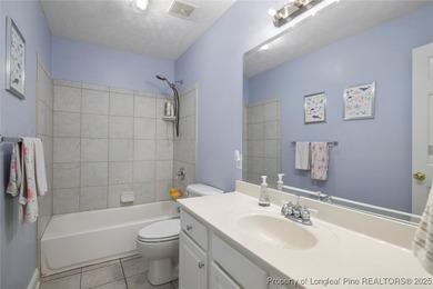 This beautiful home is located in the gated Gates Four community on Gates Four Golf and Country Club in North Carolina - for sale on GolfHomes.com, golf home, golf lot