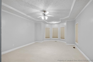 This beautiful home is located in the gated Gates Four community on Gates Four Golf and Country Club in North Carolina - for sale on GolfHomes.com, golf home, golf lot