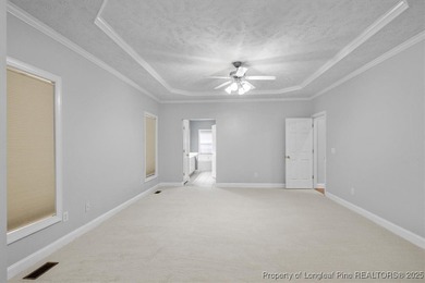 This beautiful home is located in the gated Gates Four community on Gates Four Golf and Country Club in North Carolina - for sale on GolfHomes.com, golf home, golf lot