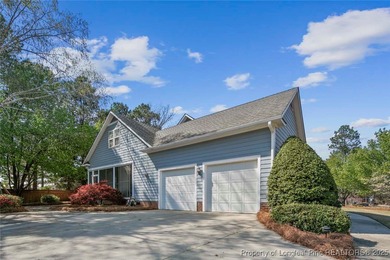 This beautiful home is located in the gated Gates Four community on Gates Four Golf and Country Club in North Carolina - for sale on GolfHomes.com, golf home, golf lot