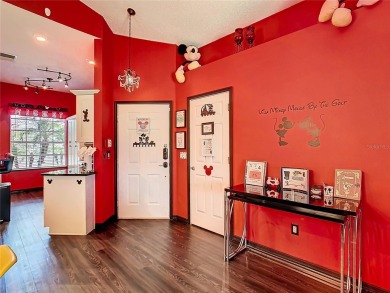 Turnkey 3 Bed, 2 Bath Mickey Mouse-Themed Pool Home in Ridgewood on Ridgewood Lakes Golf and Country Club in Florida - for sale on GolfHomes.com, golf home, golf lot