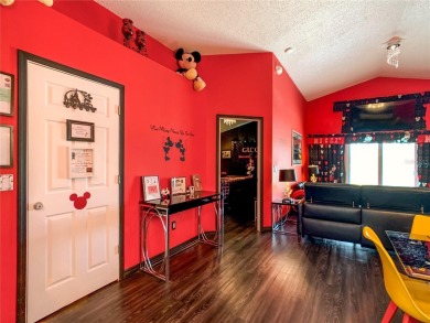 Turnkey 3 Bed, 2 Bath Mickey Mouse-Themed Pool Home in Ridgewood on Ridgewood Lakes Golf and Country Club in Florida - for sale on GolfHomes.com, golf home, golf lot