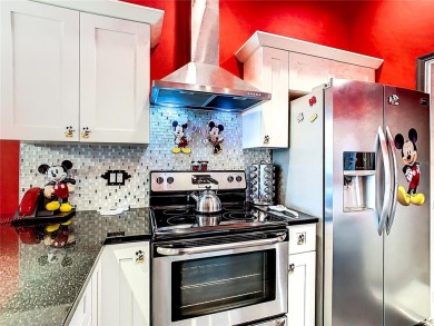 Turnkey 3 Bed, 2 Bath Mickey Mouse-Themed Pool Home in Ridgewood on Ridgewood Lakes Golf and Country Club in Florida - for sale on GolfHomes.com, golf home, golf lot